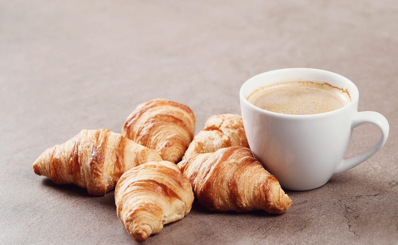 Breakfast. Delicious croissants on the table